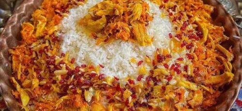 هویج پلو غذای مجلسی ایرانی که با مرغ یا گوشت معرکه می شود