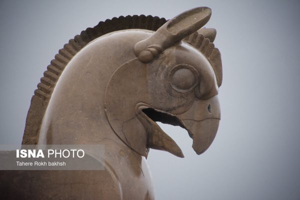 Iranian people visiting Persepolis under the rain 13