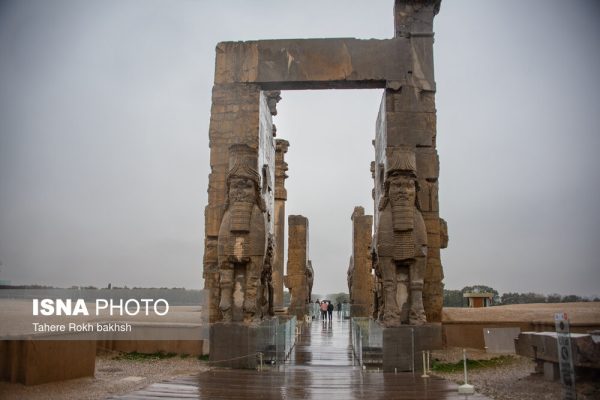 Iranian people visiting Persepolis under the rain 14