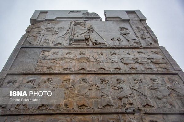 Iranian people visiting Persepolis under the rain 16