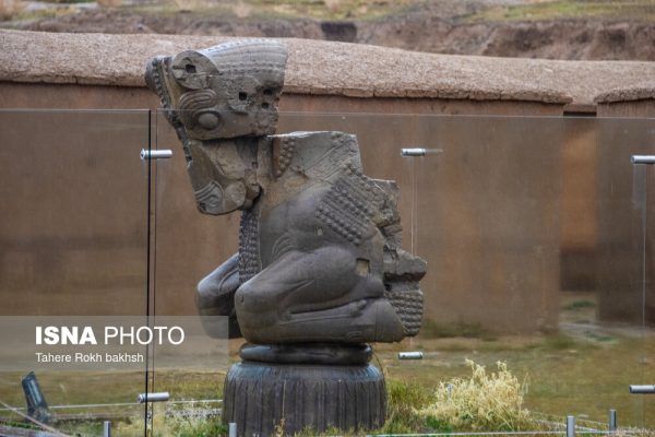 Iranian people visiting Persepolis under the rain 19