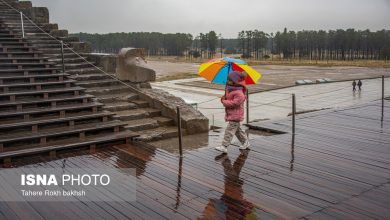 Iranian people visiting Persepolis under the rain 2