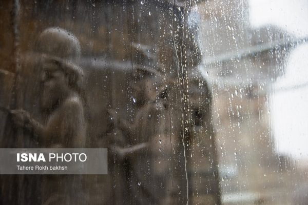 Iranian people visiting Persepolis under the rain 20