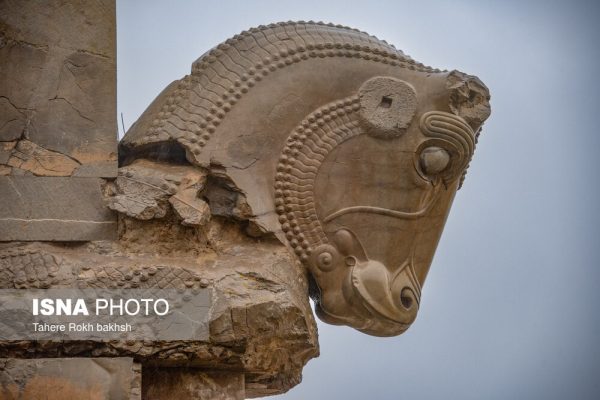 Iranian people visiting Persepolis under the rain 22