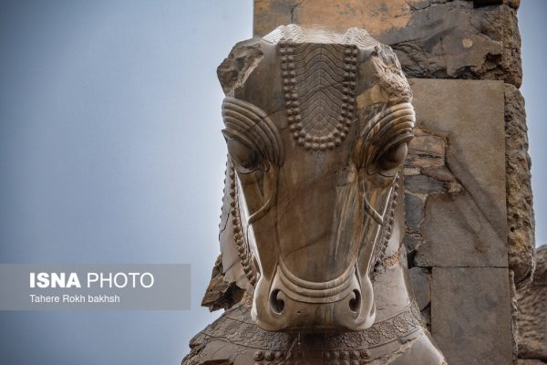 Iranian people visiting Persepolis under the rain 23