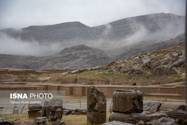 Iranian people visiting Persepolis under the rain 24