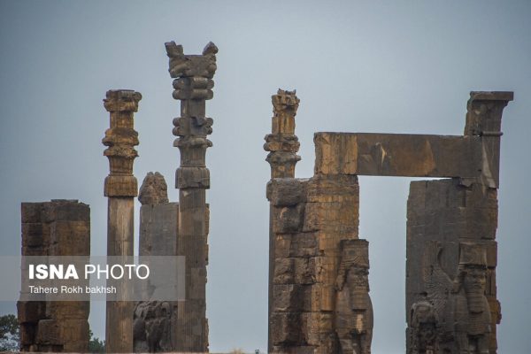 Iranian people visiting Persepolis under the rain 25