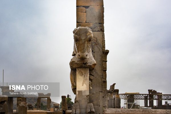 Iranian people visiting Persepolis under the rain 26