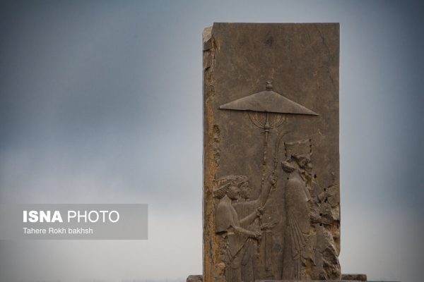 Iranian people visiting Persepolis under the rain 37