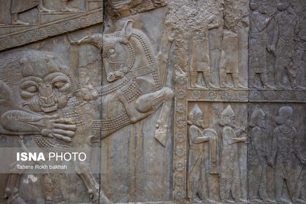 Iranian people visiting Persepolis under the rain 44