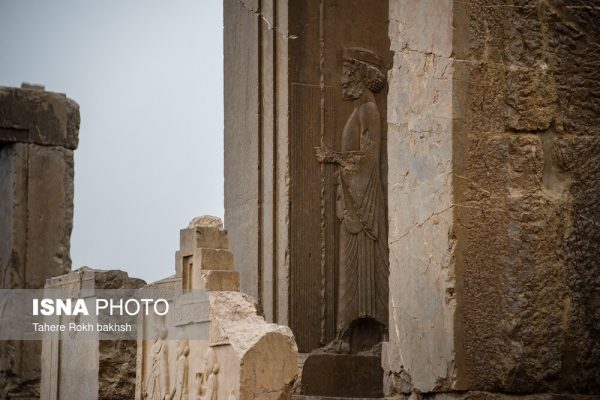 Iranian people visiting Persepolis under the rain 45