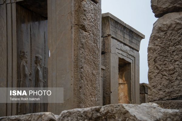 Iranian people visiting Persepolis under the rain 47