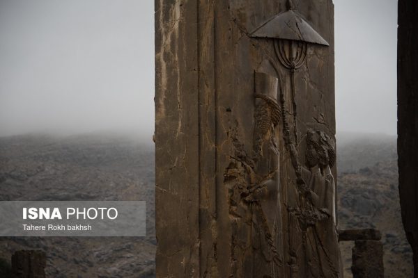 Iranian people visiting Persepolis under the rain 49