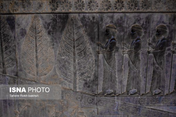 Iranian people visiting Persepolis under the rain 53