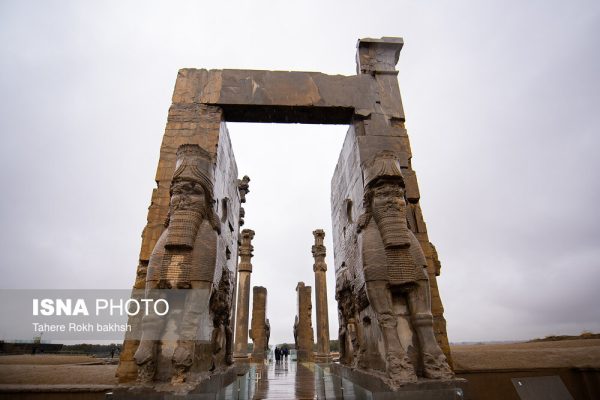 Iranian people visiting Persepolis under the rain 59