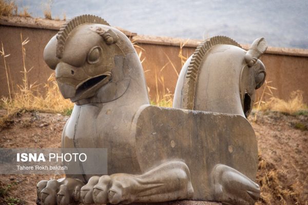 Iranian people visiting Persepolis under the rain 6